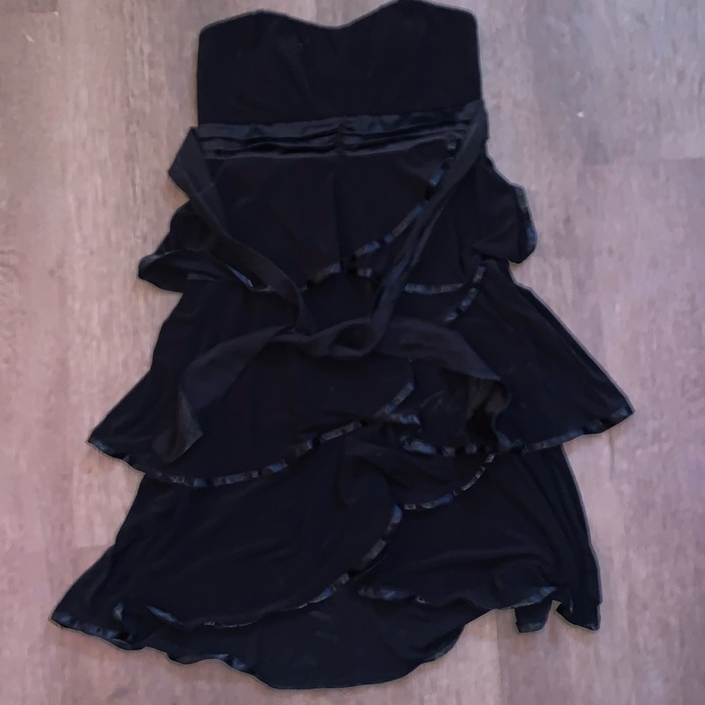 Adorable “Deb” y2k ruffle dress. Spaghetti straps and a tie at the waist!